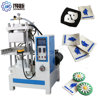 Preço de fábrica máquina de fabricação de etiqueta / logotipo / marca registrada de transferência térmica de silicone para roupas de banda de alta qualidade